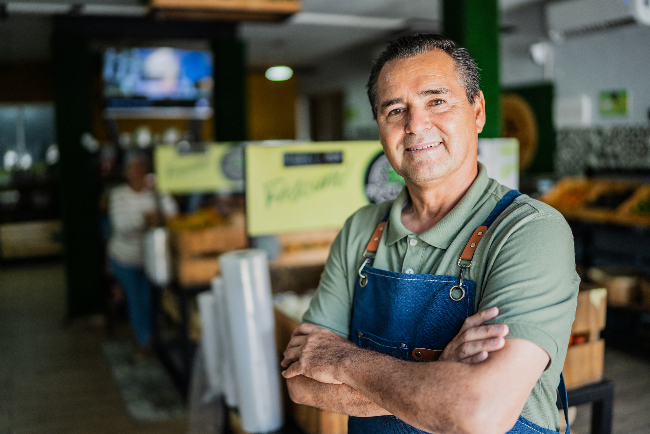 senior man working at store