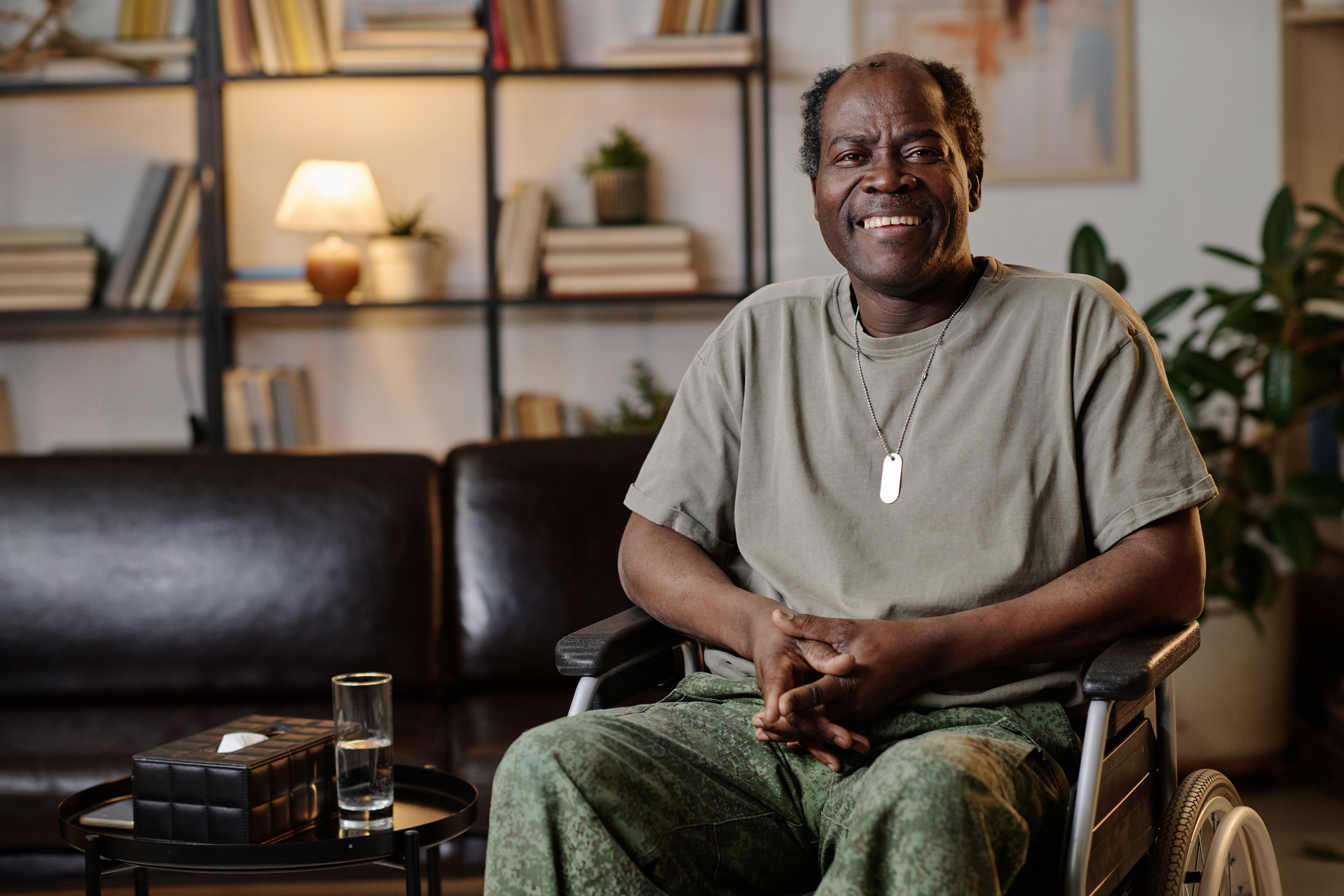 Older African American veteran sitting in wheelchair