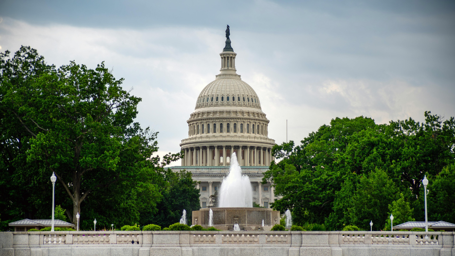 The United States Capitol building on a cloudy day.