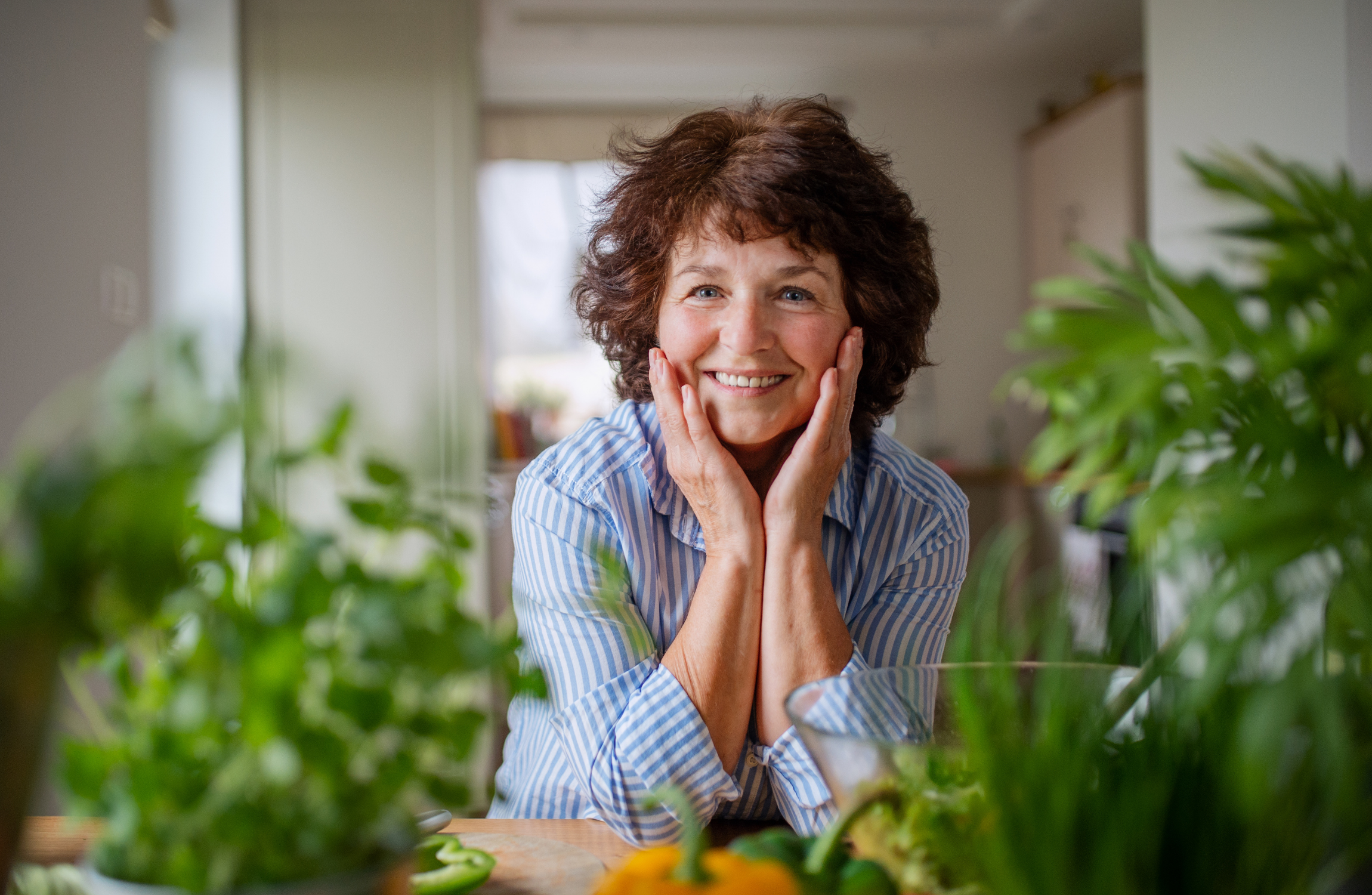 happy mature woman at home garden